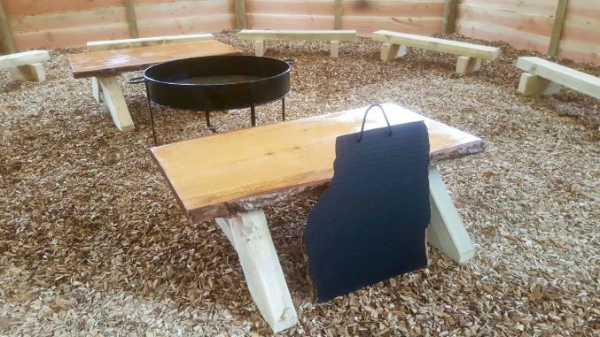 Outdoor learning seating, table, vis aids and fire pit